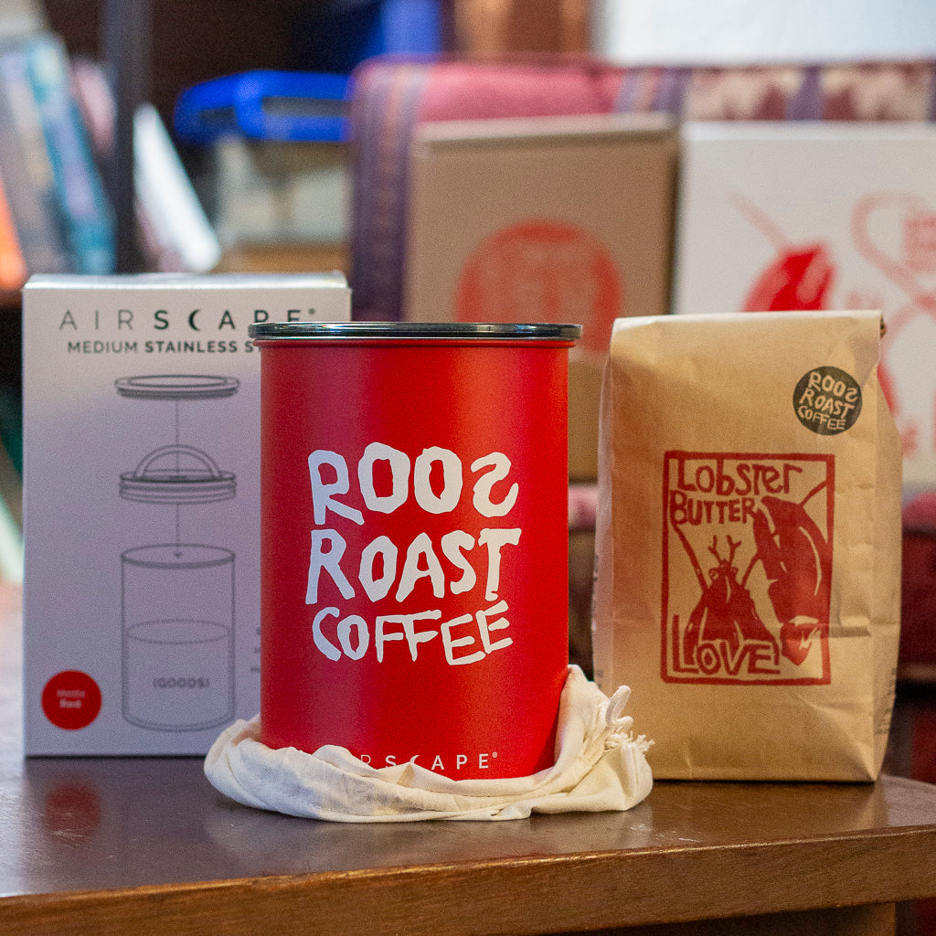 red airscape coffee bean storage container with roosroast logo