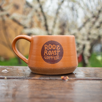 handmade grayling ceramic mug with orange roosroast logo