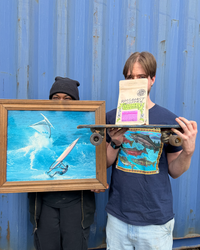 two friends holding coffee and surf picture
