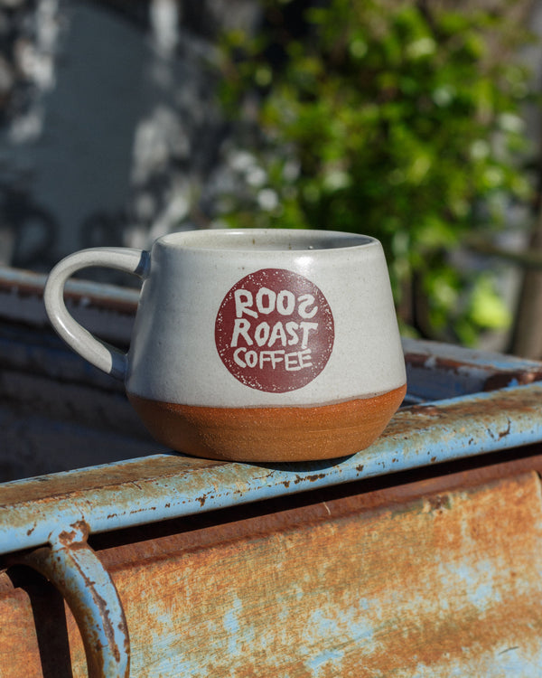 mug with roosroast logo