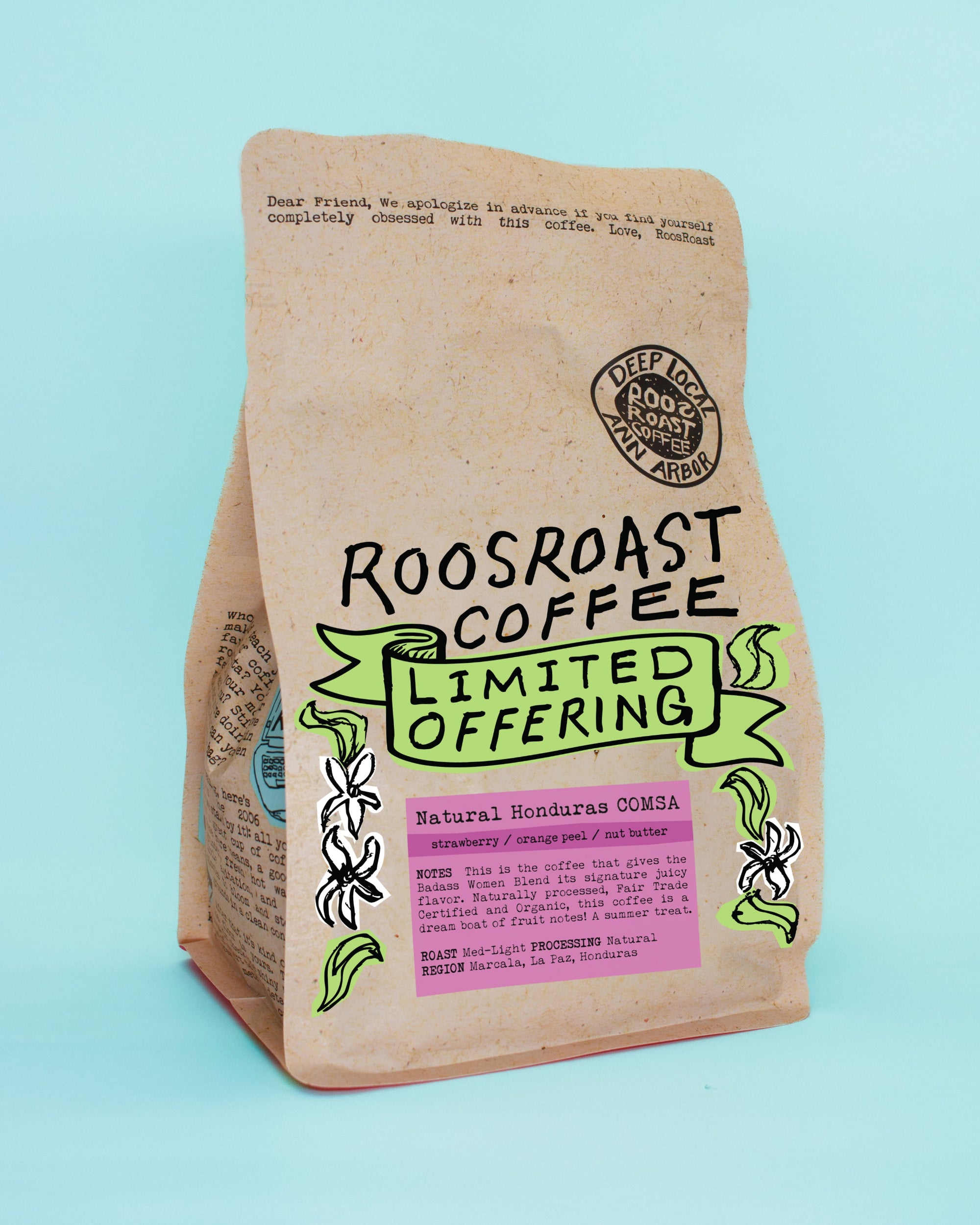 A kraft paper bag of Roosroast Coffee Limited Offering Natural Honduras Comsa coffee, set against a solid light blue background.