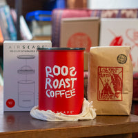 red airscape coffee bean storage container with roosroast logo