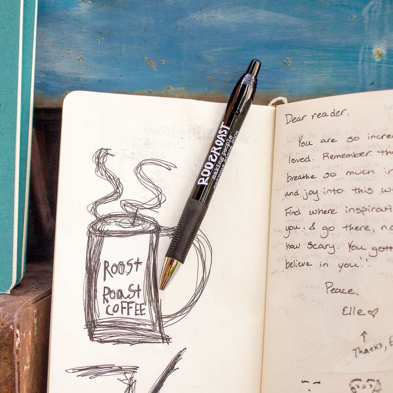 Moleskine blank notebook with pen and roosroast coffee logo