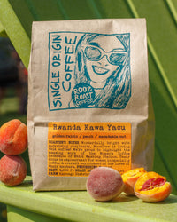 Coffee bag with a graphic of a woman and text, surrounded by peaches on a green background
