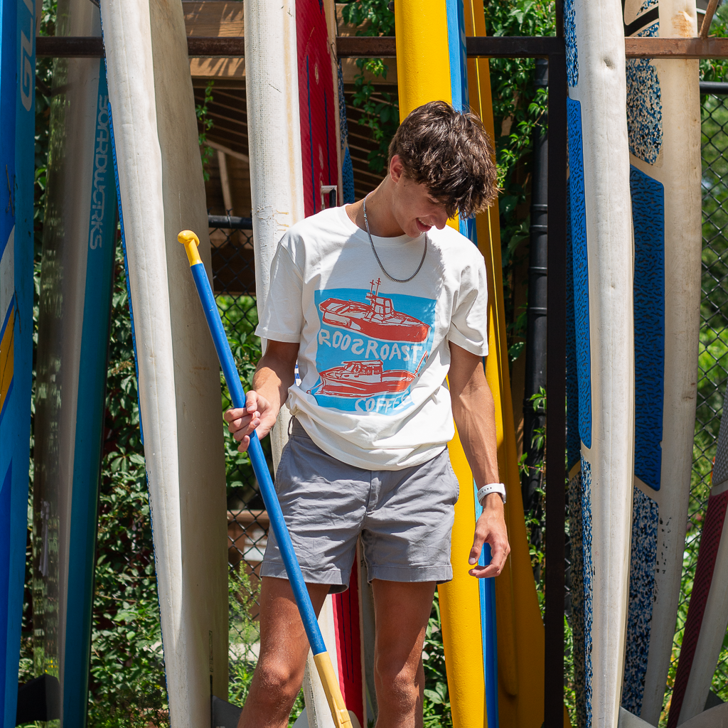 kid wearing a screen printed fishing boat t-shirt design by roosroast coffee