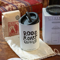 white airscape coffee bean storage container with roosroast logo