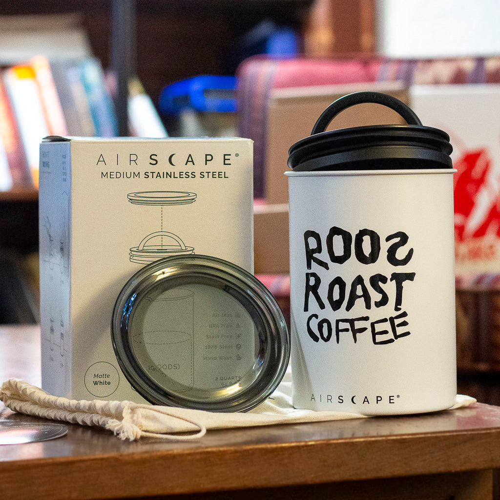 https://www.roosroast.com/cdn/shop/files/whiteairscaperoosroastcoffeefromthetop_1.jpg?v=1701819196&width=1200