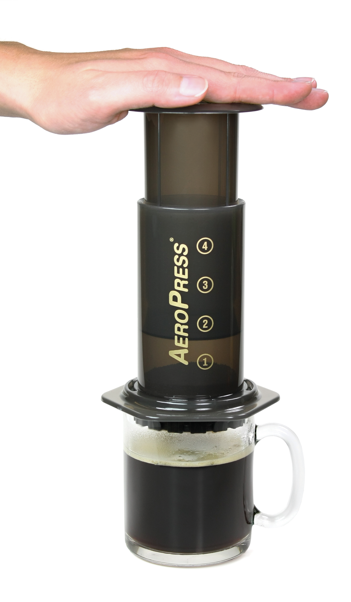 hand demonstrating aeropress the better coffee press coffee maker sold by RoosRoast Coffee in Ann Arbor Michigan