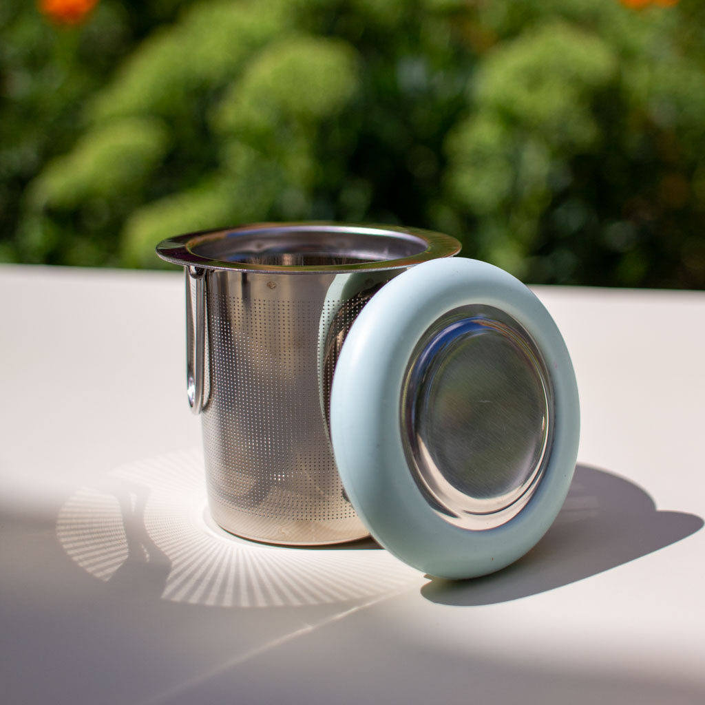 blue and green stainless steel tea strainers by roosroast