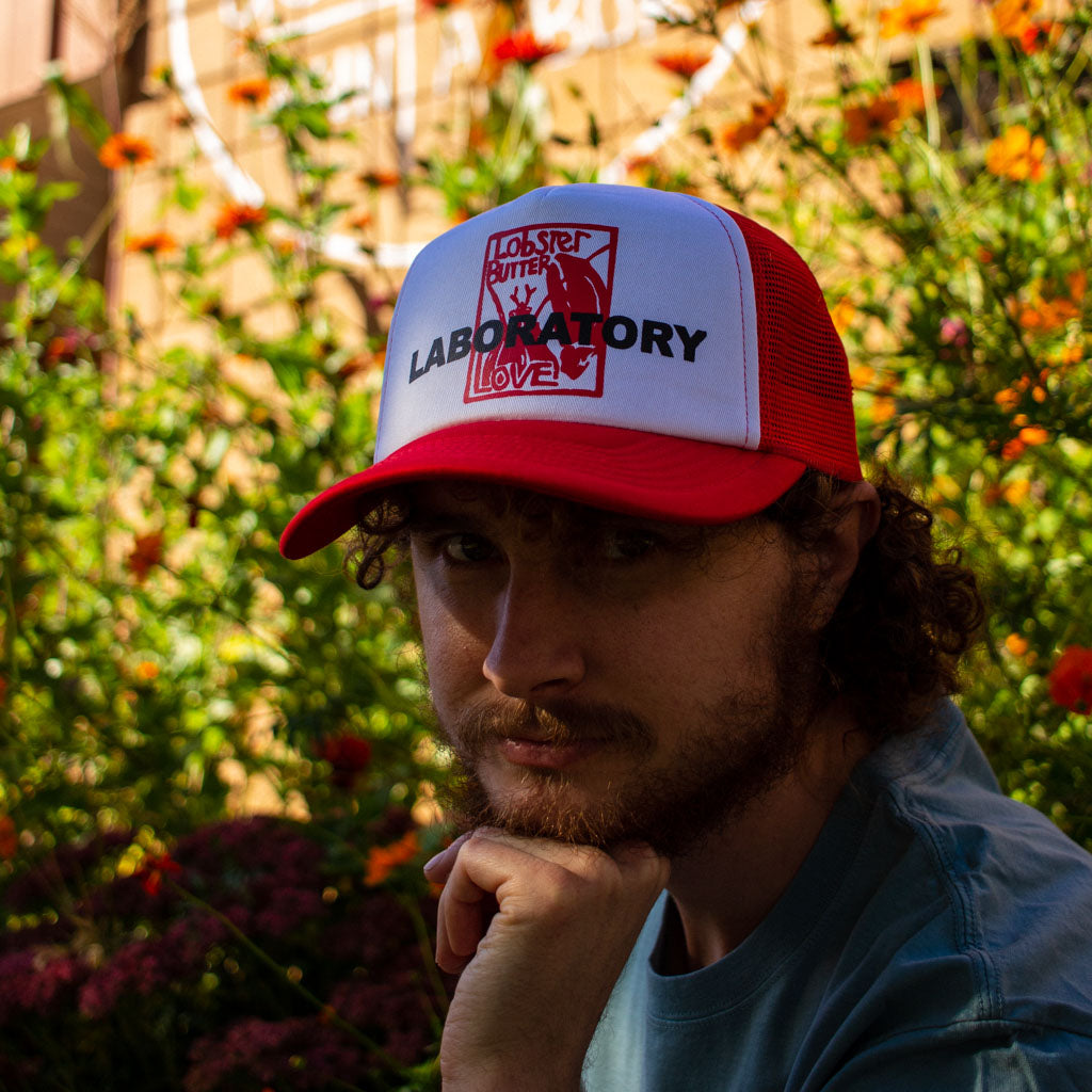 red lobster butter love laboratory red trucker hat by roosroast coffee